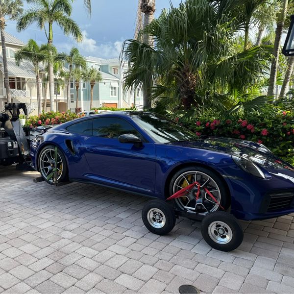 Flatbed towing corvette luxury car towing Clearwater Beach.