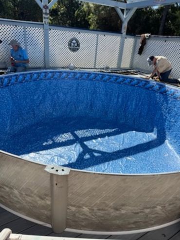 Pool liner replacement in progress for an above-ground pool