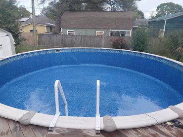 Clean above-ground pool after liner wash cleanout in Pensacola, FL