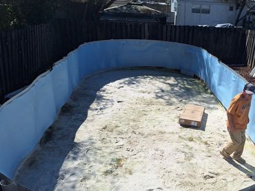 Above-ground pool prepared for liner replacement with old liner removed in Pensacola, FL