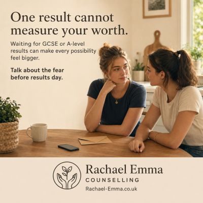 Two young women having a serious conversation at a table.