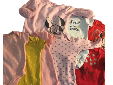 eight pieces of baby clothes