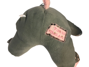 embroidered dated on the bottom of the memory bear