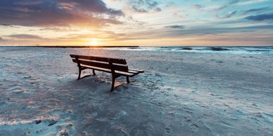 Park bench, bench in ocean, sea, beach, loneliness, lonely, sunset, sunrise, hues of blue, sun,