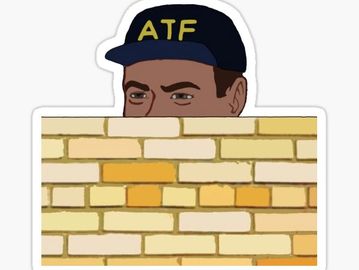 ATF agent looking over the fence at all the NFA goodies we have to offer.