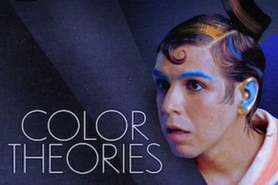 Portrait of a person with colorful makeup and hair, titled 'Color Theories'.