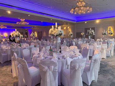 WHITE LYCRA CHAIR COVERS AND WHITE CRYSTAL ORGANZA BOWS