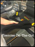 someone showing a folded treadmill safety waist belt on front of a treadmill at the gym