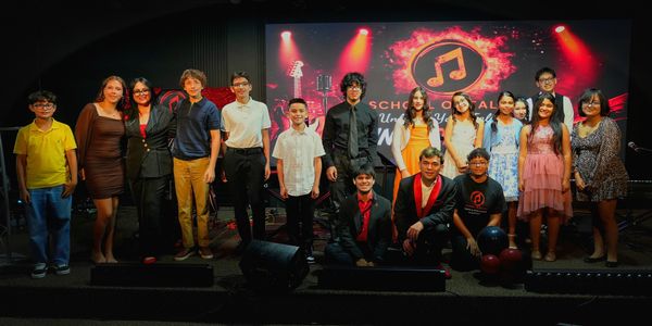 Group picture taken at Spring 2026 Concert, showcasing teachers and students after performing.