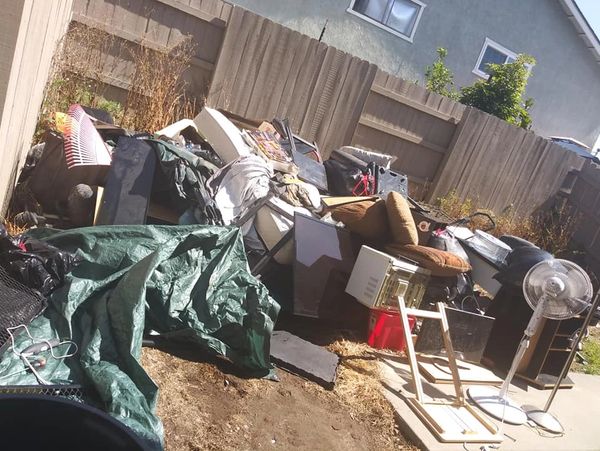 Backyard junk removal cleanout