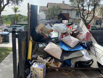 Third of a quarter load junk removal from garage.