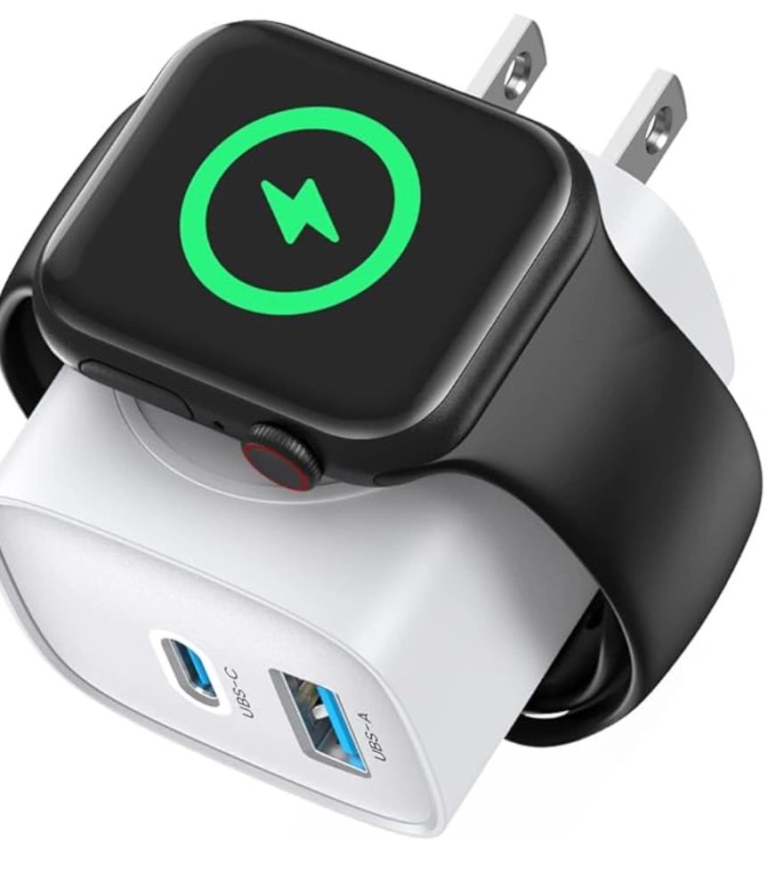 Wireless charging dock for smartwatch with USB ports.