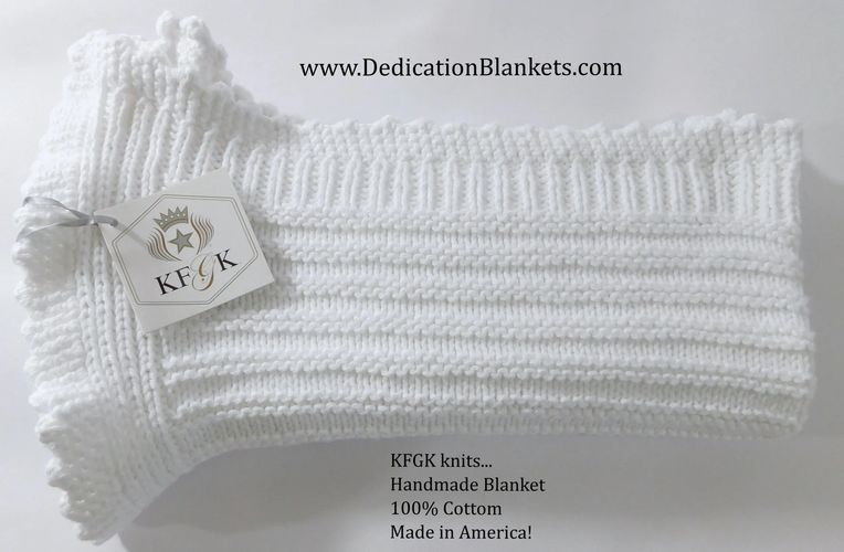 Handmade white knitted blanket with a KFGK tag, made of 100% cotton.