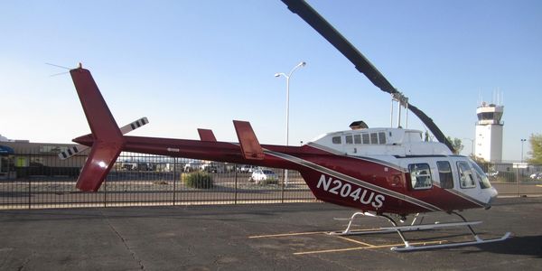 A Bell 206B3 Jet Ranger, serial 51415, awaiting customer pickup.