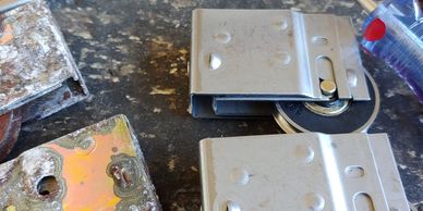 If the rollers are rusted, they may benefit from a stainless steel option as they did here.