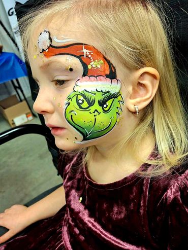 Maquillage de Mr. Grinch fait par notre talentuesuse Artiste Maquilleuse