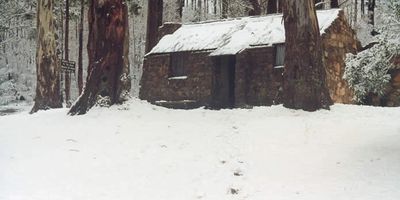 Old stone hut in deep snow