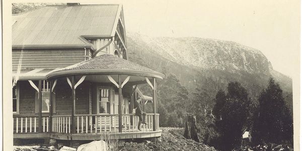 historical image of the old Springs Hotel site, in faded black and white