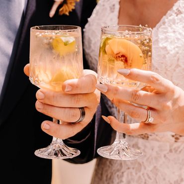 Signature cocktails in vintage goblets at a wedding