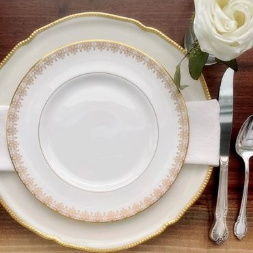 Place setting with vintage white dinnerware