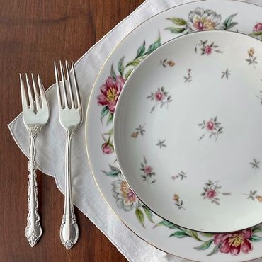 mismatched floral patterned plates in garden inspired floral patterns
