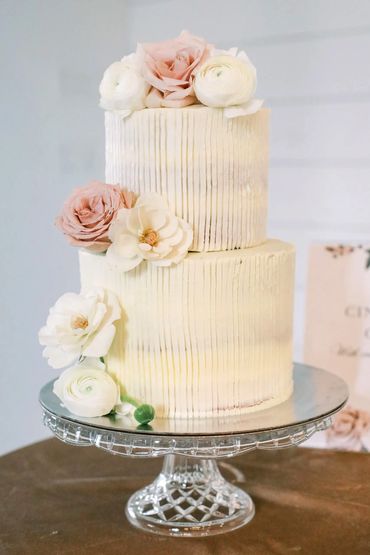 Wedding cake on a crystal footed cake plate