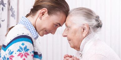 Caregiver shares moment with elder