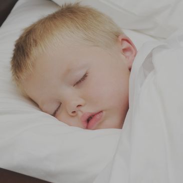 Baby sleeping peacefully all through the night