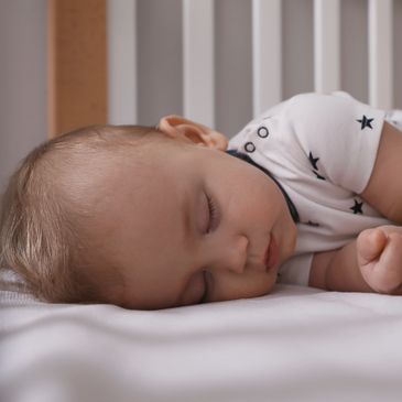 Baby sleeping peacefully all through the night