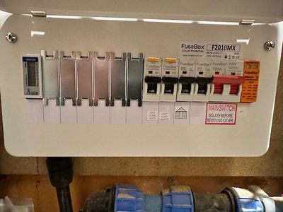 Consumer unit to supply garden outbuilding/office, EV charging point and surge protection.