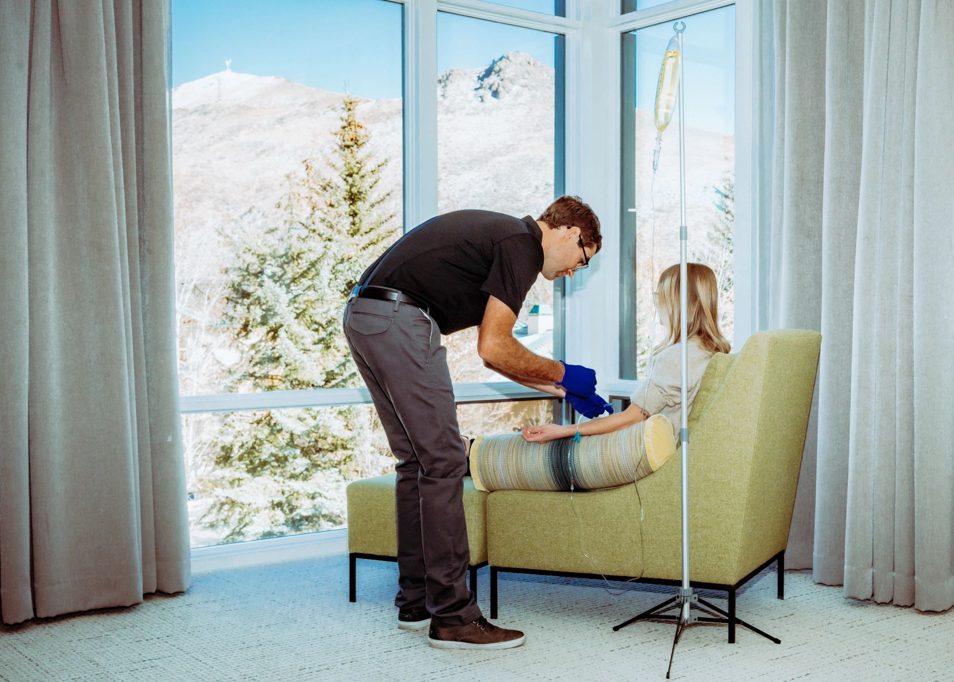An individual receiving IV Therapy treatment