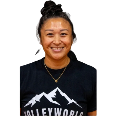 Smiling woman wearing a black t-shirt with mountain graphics and text.