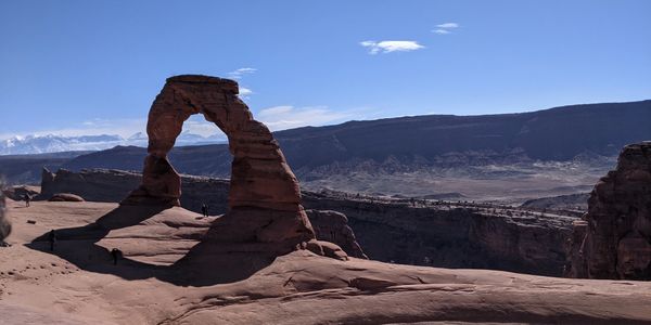 Delicate Arch in Arches National Park under a clear blue sky.