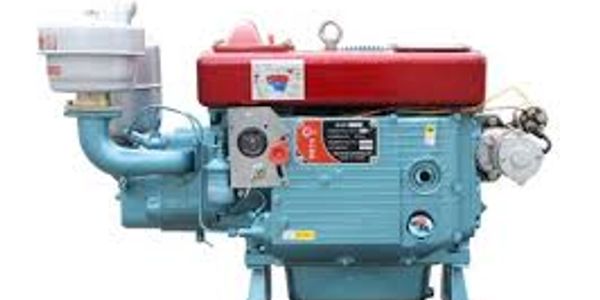A red and blue diesel engine with various mechanical parts.