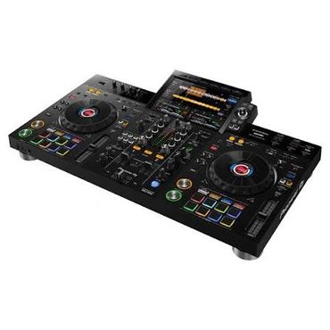 Professional DJ controller with dual jog wheels and touchscreen.