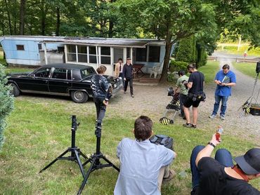 Photo of a film crew filming a movie at Houser's Crossing.