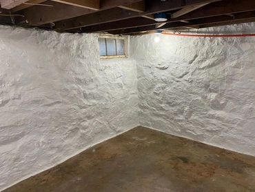 Lime mortar stone foundation waterproofing.