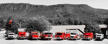 Firetruck line up in front of Pine Strawberry station