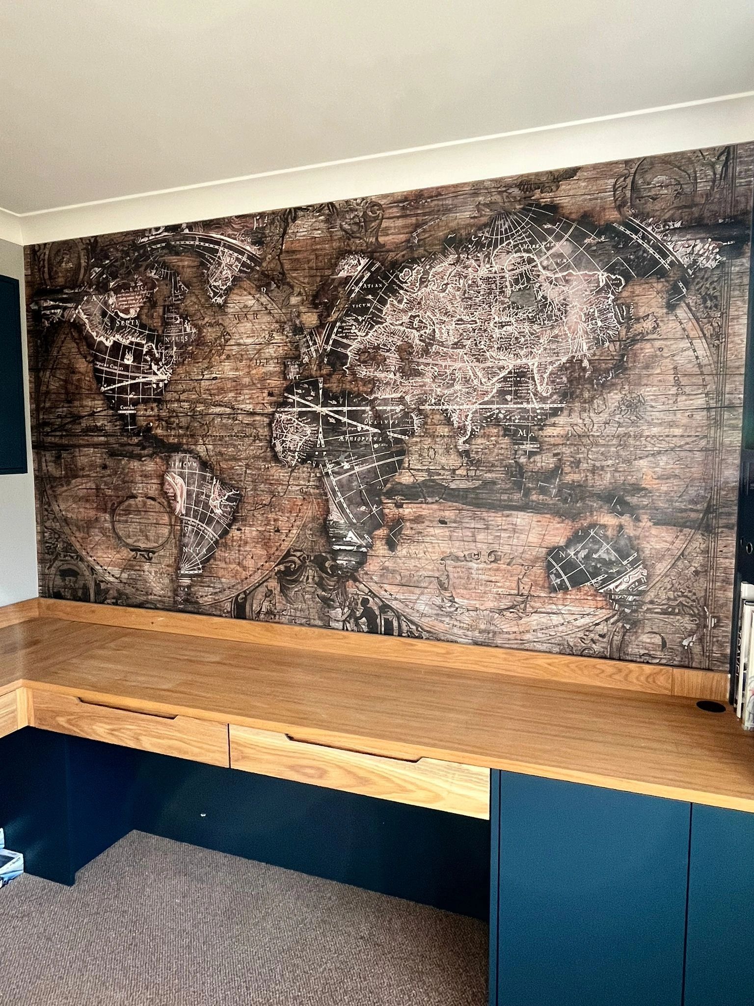Professional Ely based decorating providing a map mural succeeding in a statement look in your home