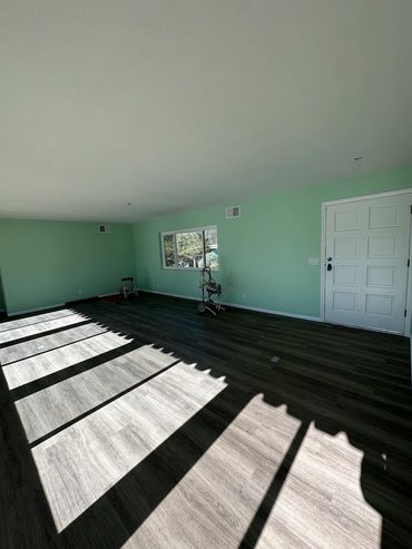 Lining area of Alpine home house remodel with new floors and paint