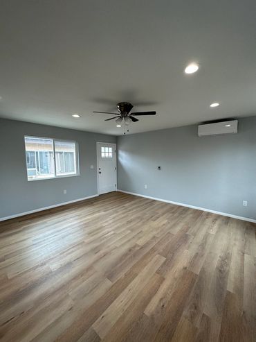 Front living area of ADU with paint an flooring complete LZ Construction Remodeling