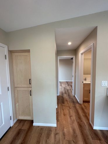 Hallway and built in storage area in Clairemont ADU, LZ Construction Design/Build