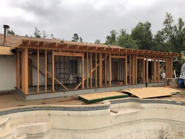 Exterior framing of room addition in Lakeside, CA showering window and door openings