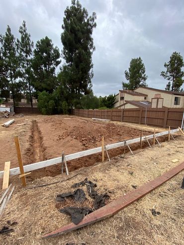 Forms and excavation of footings and slab