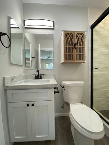New bathroom in La Mesa, CA master suite addition, with vanity and toilet.
