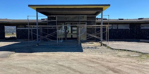 Lakeside custom single story home with covered entry