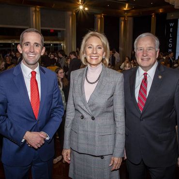 Jeff Hunt and Betsy DeVos.