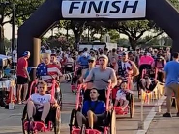 Contraband 5Miler start/finish line with AA starting.