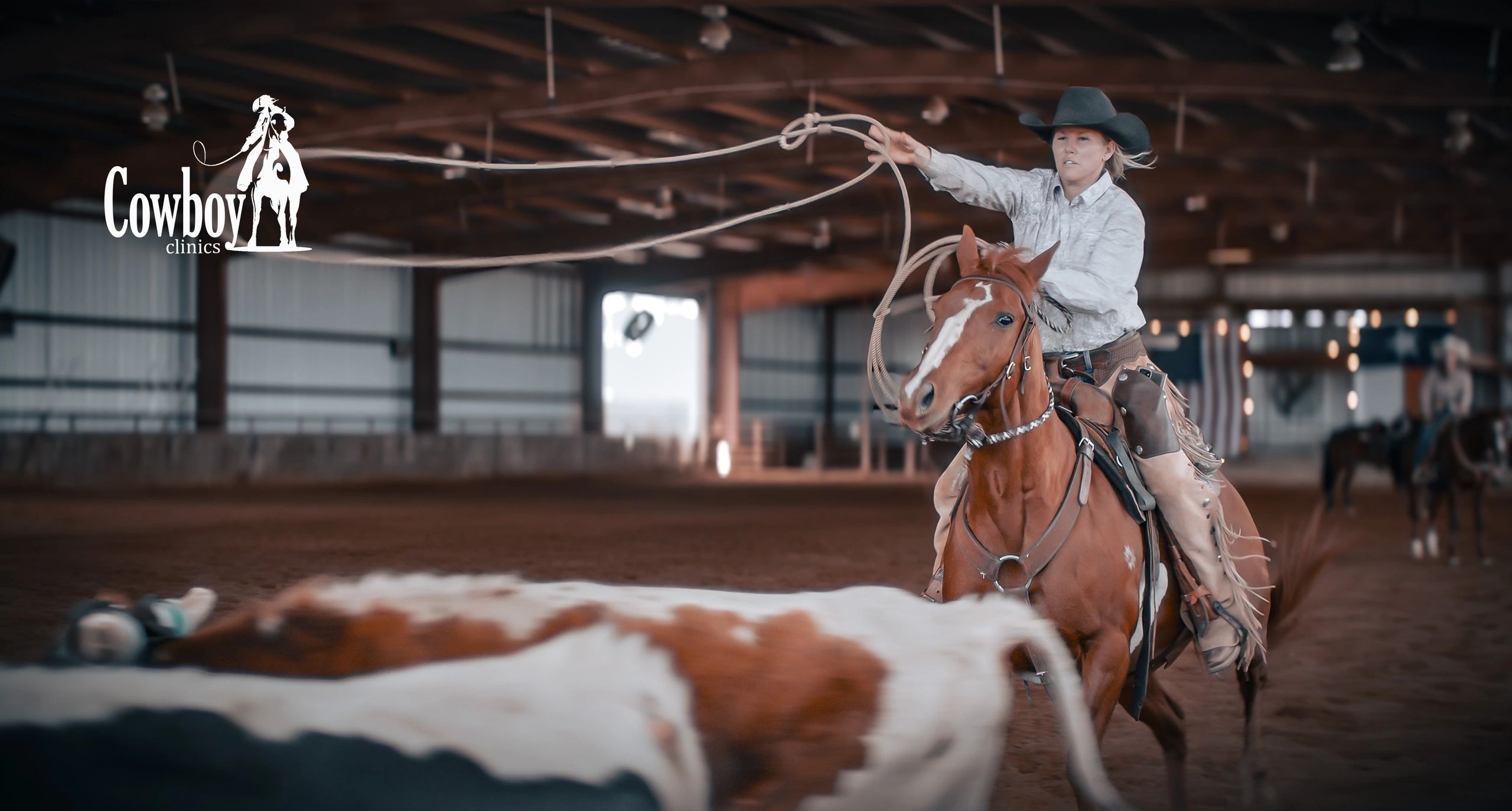 Cowgirl Roping cattle at our cowboy school