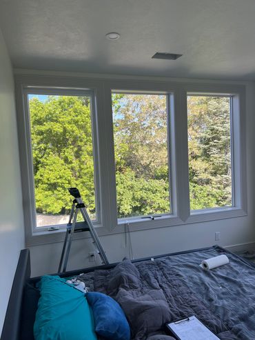 Left window in this set is tinted showing the slight darkness compared to the other panes of glass.